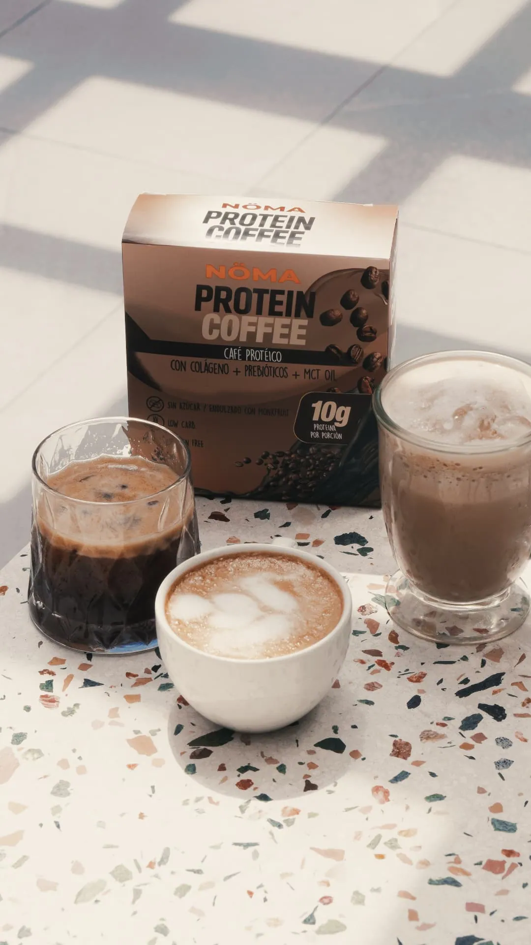 Caja NÖMA con tres preparaciones: café frío, latte y cappuccino